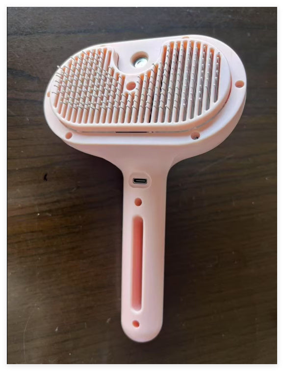 Self-Cleaning Grooming Comb with Mist