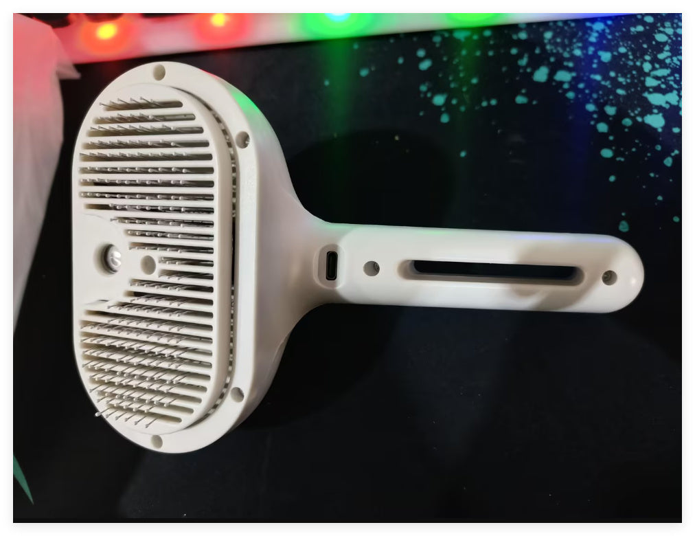 Self-Cleaning Grooming Comb with Mist